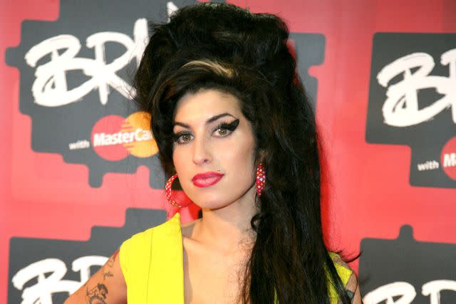 <p>JMEnternational/Redferns</p> Amy Winehouse attends the BRIT Awards in 2007