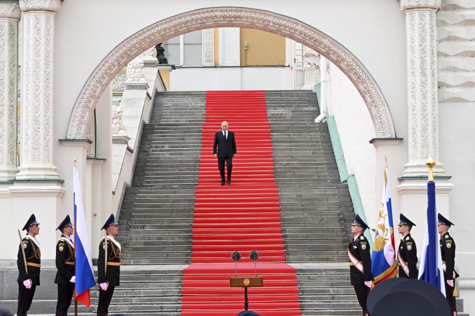 FILE - Russian President Vladimir Putin listens arrives to deliver a speech at the Kremlin in Moscow, Russia, Tuesday, June 27, 2023 to the units of the Russian Defense Ministry, the Russian National Guard (Rosgvardiya), the Russian Interior Ministry, the Russian Federal Security Service and the Russian Federal Guard Service, who ensured order and legality during the mutiny. A week after the mutiny raised the most daunting challenge to President Vladimir Putin’s rule in over two decades, key details about the uprising remain shrouded in mystery. (Sergei Guneyev, Sputnik, Kremlin Pool Photo via AP, File)