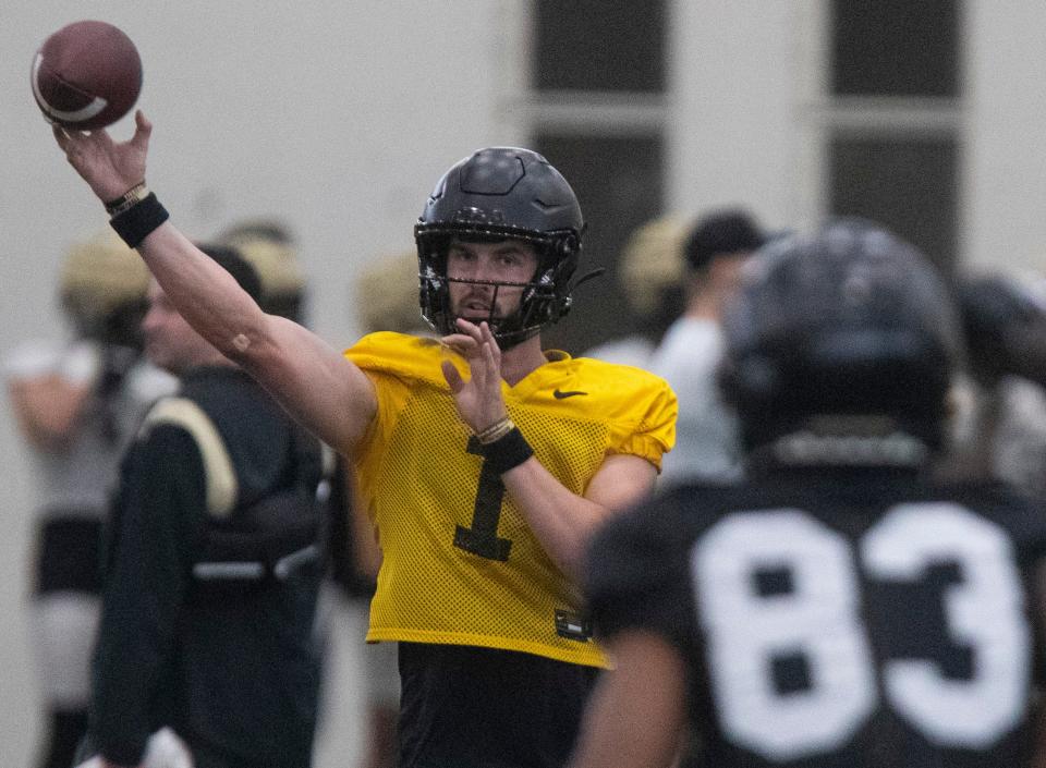Purdue Boilermakers quarterback Hudson Card (1) throws the ball during spring football practice, Thursday, March 23, 2023, at Mollenkopf Athletic Center in West Lafayette, Ind. 