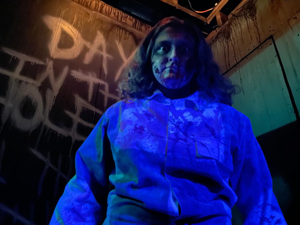 A menacing actor inside of the Hudson Haunted House.