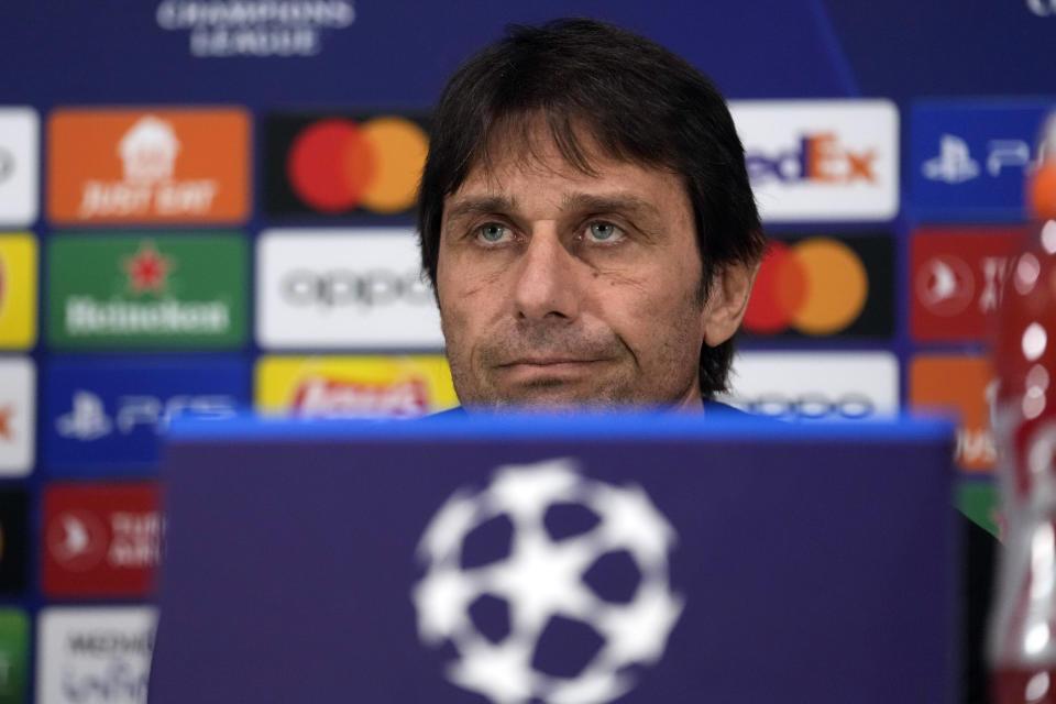 FILE - Tottenham's head coach Antonio Conte listens during a news conference ahead of a Champions League, round of 16, first leg soccer match between AC Milan and Tottenham Hotspur at the San Siro stadium in Milan, Italy, Monday, Feb. 13, 2023. Tottenham announced that manager Antonio Conte has left the Premier League club "by mutual agreement." (AP Photo/Luca Bruno, File)