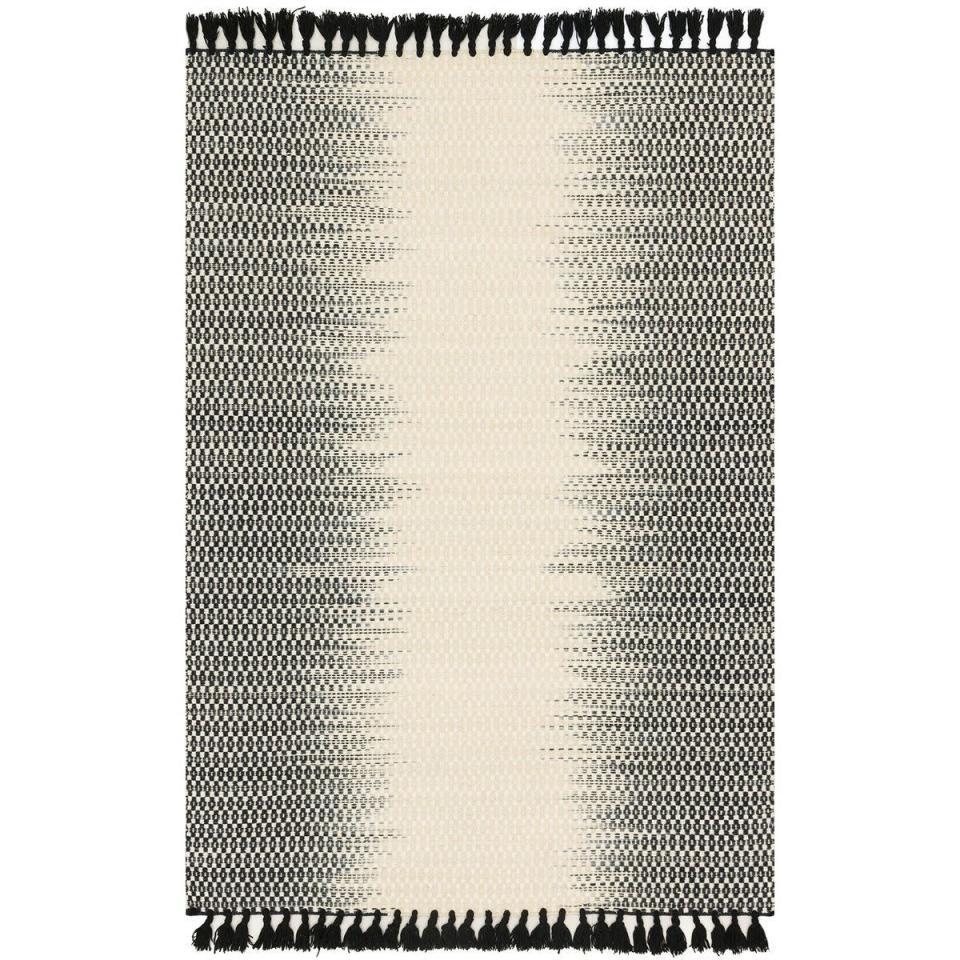 <p><strong>Magnolia Home</strong> Chantilly Black Rug, $99-$799, available at <a href="https://www.pier1.com/magnolia-home-chantilly-black-rug/PS77402.html?cgid=magnolia-home#icid=3260&start=1" rel="nofollow noopener" target="_blank" data-ylk="slk:Pier 1" class="link ">Pier 1</a>.</p><span class="copyright">Photo: Courtesy of Pier 1.</span>