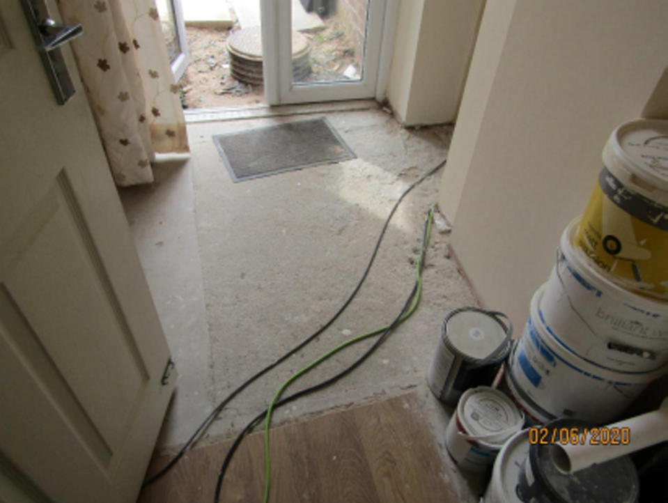 Picture shows cables and an uneven floor. (SWNS)
