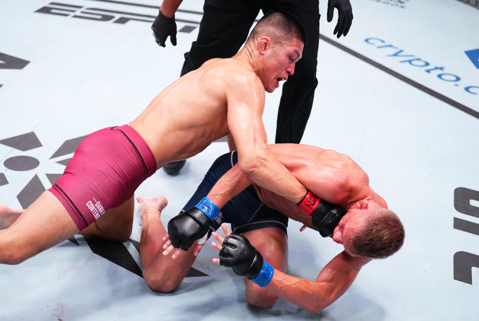 LAS VEGAS, NEVADA – SEPTEMBER 12: (L-R) Steven Nguyen punches AJ Cunningham in a featherweight fight during Dana White’s Contender Series season seven, week six at UFC APEX on September 12, 2023 in Las Vegas, Nevada. (Photo by Chris Unger/Zuffa LLC via Getty Images)