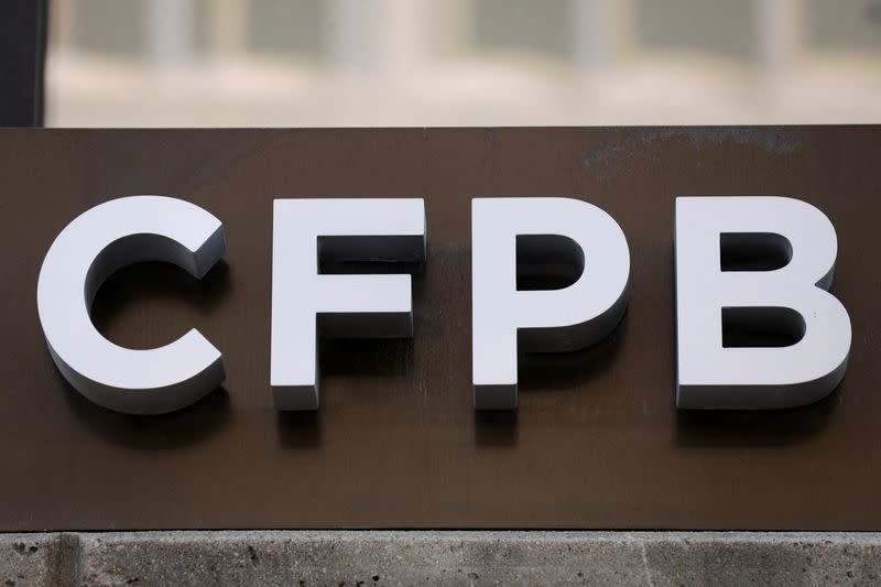 FILE PHOTO: Signage is seen at the Consumer Financial Protection Bureau (CFPB) headquarters in Washington, D.C.