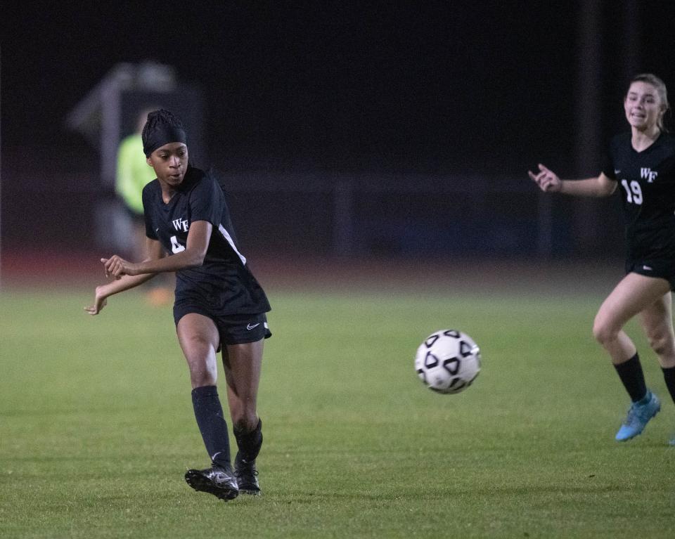 Spirit  Meeks (4) passes the ball during the Navarre vs West Florida girls soccer game at West Florida High School in Pensacola on Tuesday, Jan. 17, 2023.