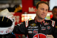 FORT WORTH, TX - NOVEMBER 05: Kevin Harvick, driver of the #29 Rheem Chevrolet, stands in the garage during practice for the NASCAR Sprint Cup Series AAA Texas 500 at Texas Motor Speedway on November 5, 2011 in Fort Worth, Texas. (Photo by Todd Warshaw/Getty Images for NASCAR)