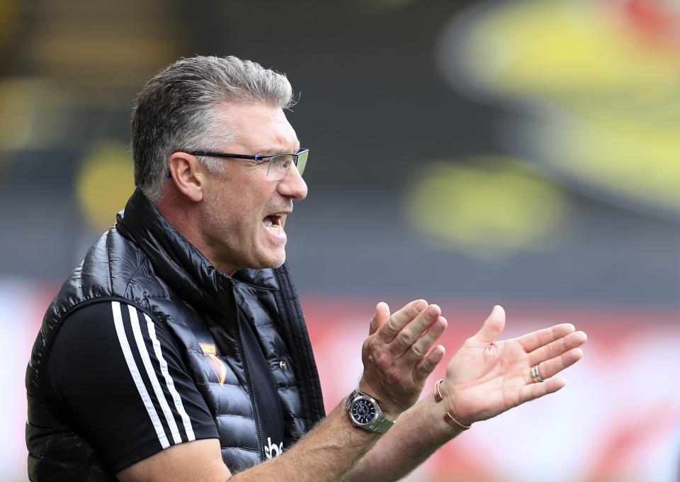 Watford's head coach Nigel Pearson applauds during the English Premier League soccer match between Watford and Newcastle at the Vicarage Road Stadium in Watford, England, Saturday, July 11, 2020. (Mike Egerton/Pool via AP)