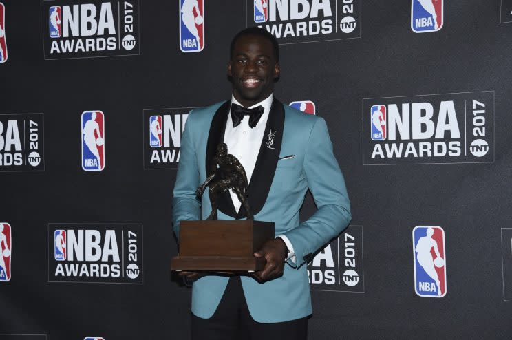 Draymond Green dressed boldly and accepted his first Defensive Player of the Year award. (AP)