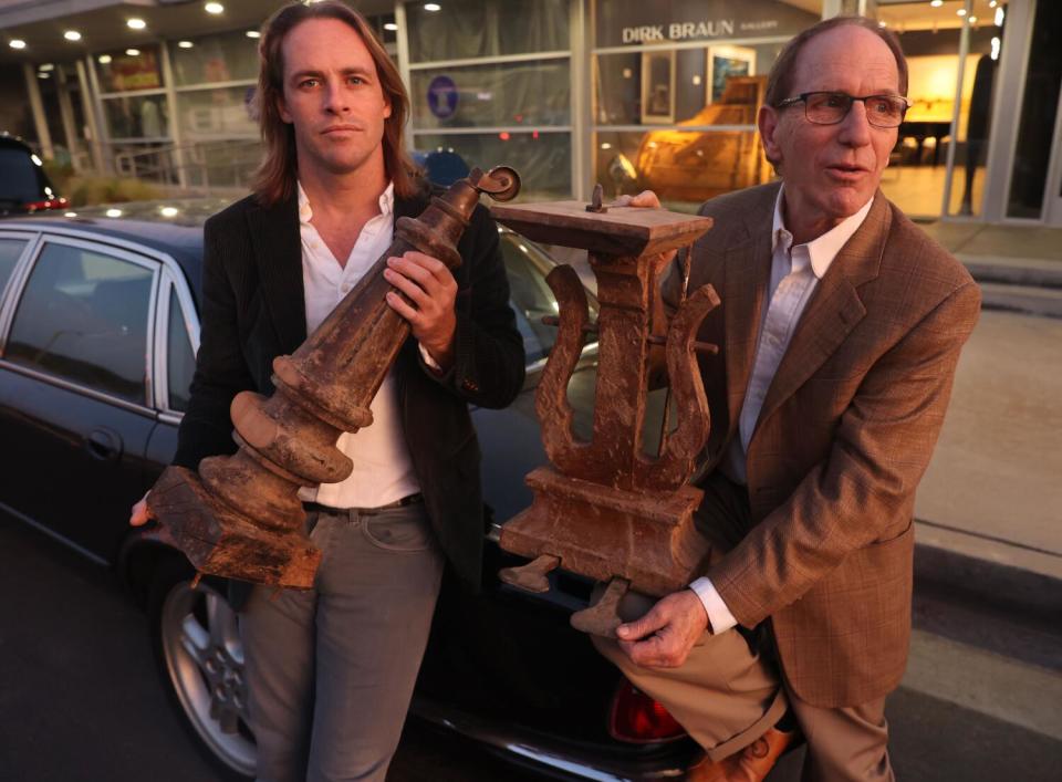 Kyril Kasimoff, right, and Dirk Bruan pose for a portrait outside of the Dirk Braun Gallery in Malibu.