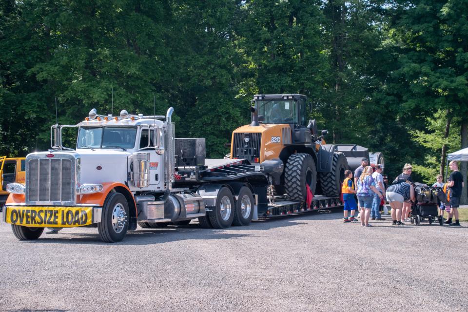 A huge semi from Pine Tree Towing is on display at the Hospice of Guernsey Touch-a-Truck event.