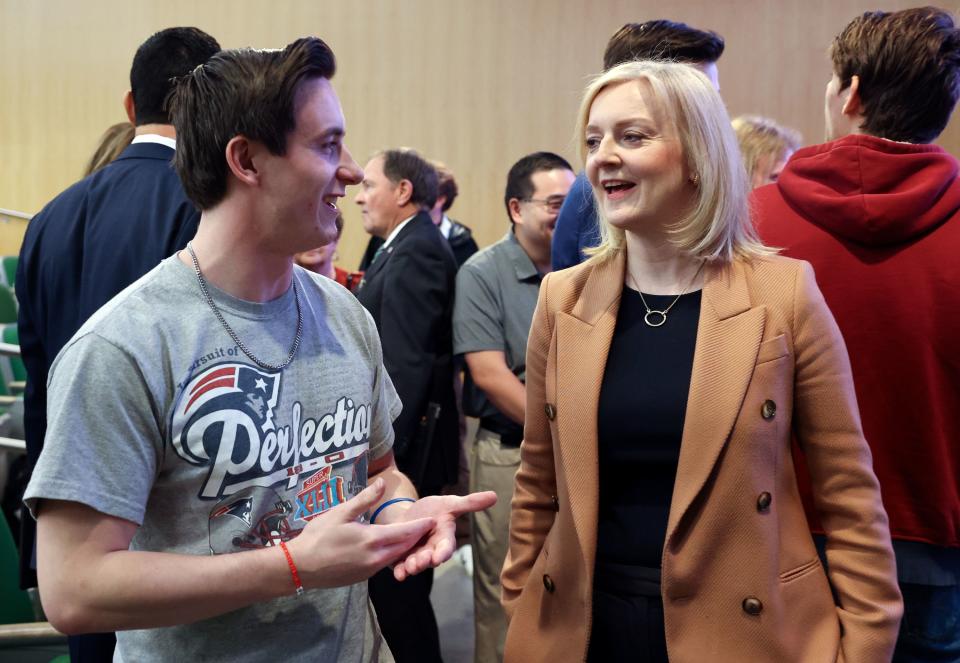 Utah Valley University student Jed Jacobi talks with former British Prime Minister Liz Truss after a Gary R. Herbert Institute for Public Policy Forum at UVU in Orem on Tuesday, Feb. 20, 2024. | Kristin Murphy, Deseret News