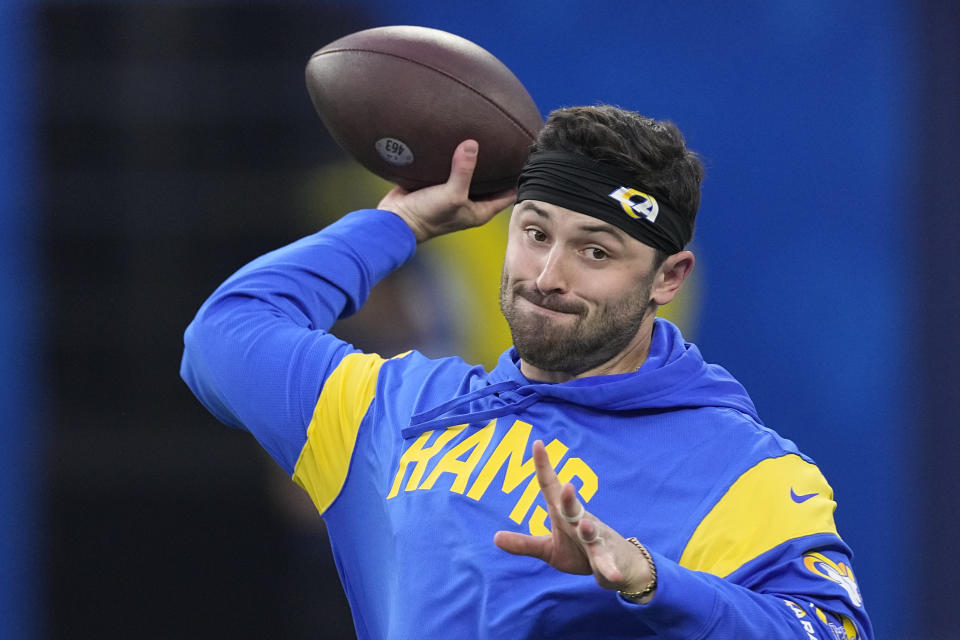 Los Angeles Rams quarterback Baker Mayfield warms up before Thursday night&#39;s game against the Raiders. (AP Photo/Mark J. Terrill)