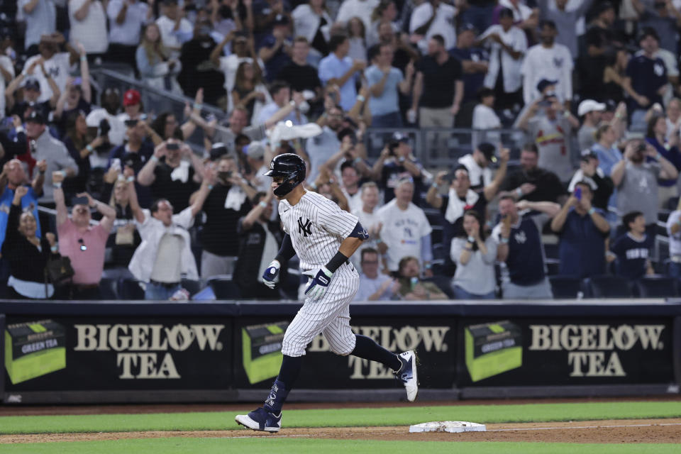 New York Yankees&#39; Aaron Judge runs the bases after hitting his 60th home run of the season, during the ninth inning of the team&#39;s baseball game against the Pittsburgh Pirates on Tuesday, Sept. 20, 2022, in New York. (AP Photo/Jessie Alcheh)