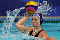 United States' Kaleigh Gilchrist plays against Japan during a preliminary round women's water polo match at the 2020 Summer Olympics, Saturday, July 24, 2021, in Tokyo, Japan. (AP Photo/Mark Humphrey)