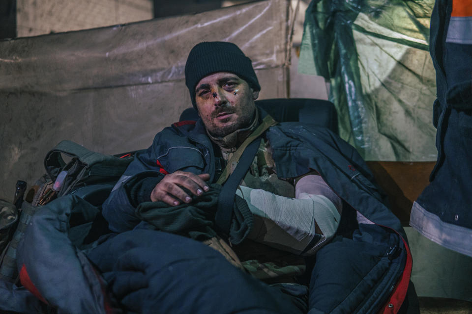 In this photo provided by Azov Special Forces Regiment of the Ukrainian National Guard Press Office, a Ukrainian soldier injured during fighting against Russian forces, poses for a photographer inside the Azovstal steel plant in Mariupol, Ukraine, May 10, 2022. For nearly three months, Azovstal’s garrison clung on, refusing to be winkled out from the tunnels and bunkers under the ruins of the labyrinthine mill. A Ukrainian soldier-photographer documented the events and sent them to the world. Now he is a prisoner of the Russians. His photos are his legacy.(Dmytro Kozatski/Azov Special Forces Regiment of the Ukrainian National Guard Press Office via AP)