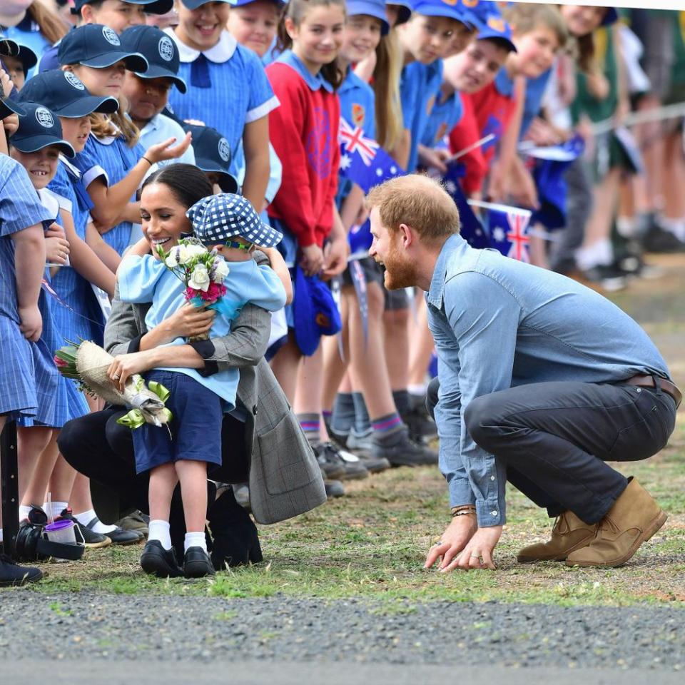 Luke Vincent hugging Meghan Markle