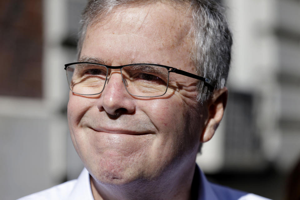 Former Florida Gov. Jeb Bush speaks to reporters as he leaves an event in New York, Thursday, April 23, 2015