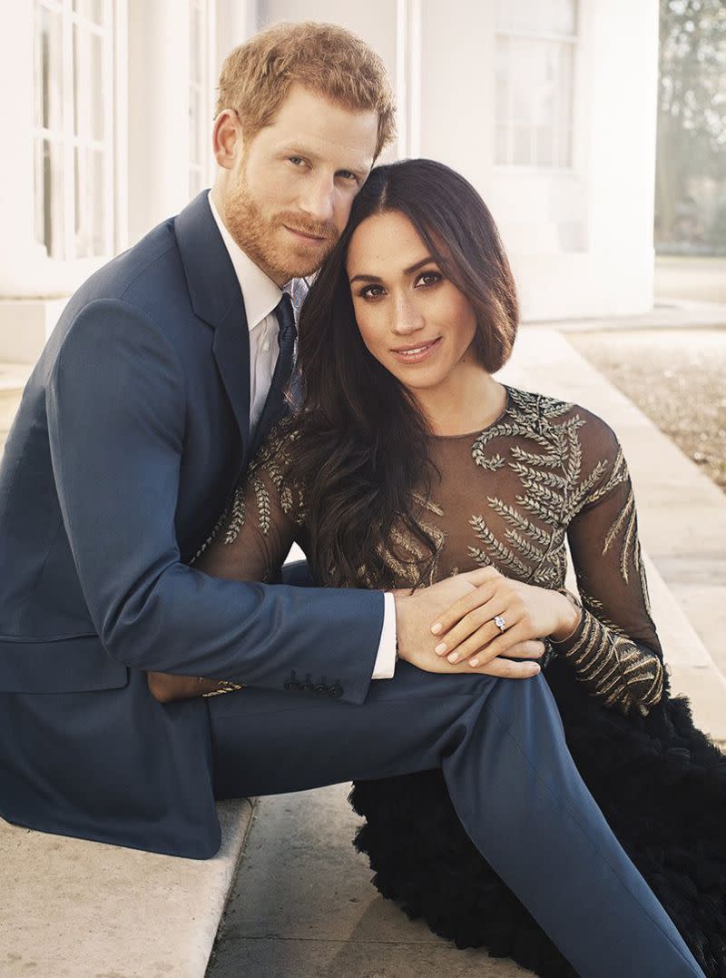 <p>On 21 December 2017, Kensington Palace shared a photograph of newly-engaged couple Prince Harry and Meghan Markle.<br><br>Photographer Alexi Lubomirski took the image on the steps of Frogmore House in Windsor Castle earlier in the week.<br><br>In the sweet snap, <em>Suits</em> actress Meghan Markle dons a couture gown by Ralph and Russo. <em>[Photo: Kensington Palace]</em> </p>
