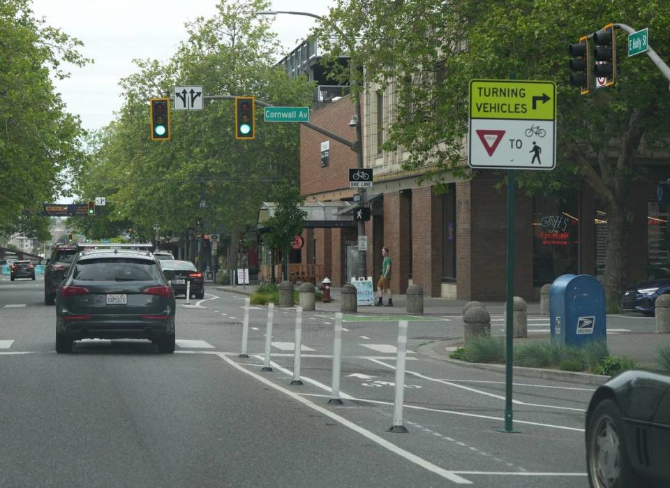 The city has installed traffic signals on Holly Street to help indicate the presence of cyclists and pedestrians to drivers in downtown Bellingham, Washington.