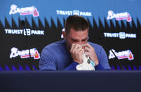 Los Angeles Dodgers' Freddie Freeman, formerly of the Atlanta Braves, becomes emotional during a pregame baseball news conference before taking on his former team, Friday, June 24, 2022, in Atlanta. (Curtis Compton/Atlanta Journal-Constitution via AP)