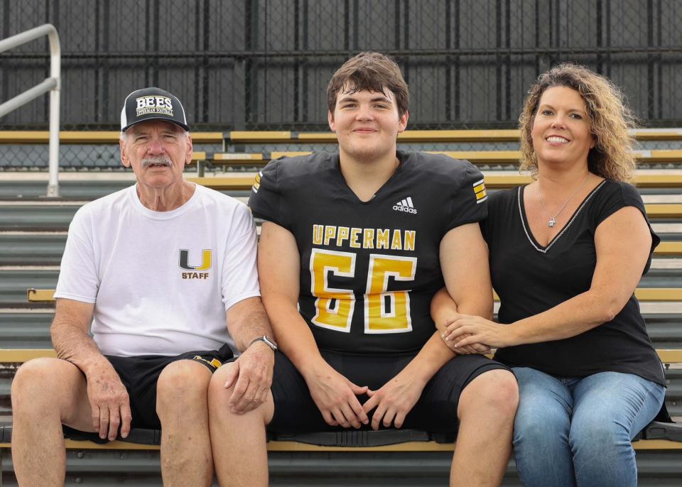 Longtime Upperman fan and booster JT Butler, far left, with son Luke and ex-wife Donna. Butler died last Friday after Upperman's 21-14 Class 4A semifinal win at Greeneville. He was 76.