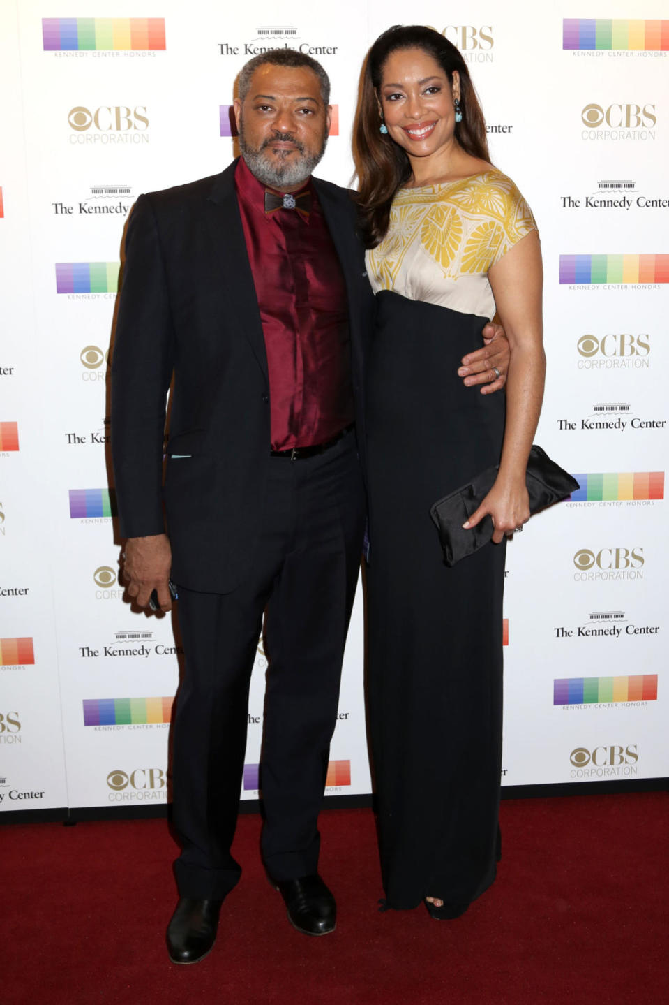 Laurence Fishburne and Gina Torres at the 38th Annual Kennedy Center Honors at The Kennedy Center Hall of States in Washington, DC.