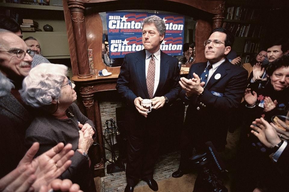 Democrat Bill Clinton campaigns at a house party in Concord in 1991. A campaign stop today is also a social media blast.