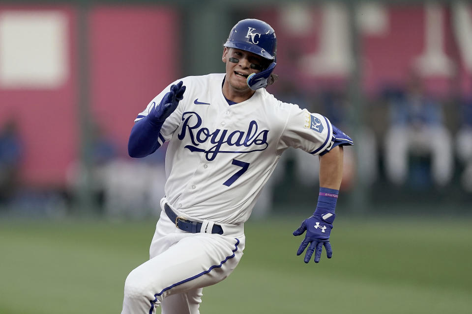 Kansas City Royals' Bobby Witt Jr. runs to third after hitting a triple during the first inning of a baseball game against the Detroit Tigers Thursday, April 14, 2022, in Kansas City, Mo. (AP Photo/Charlie Riedel)