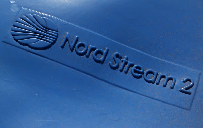 FILE PHOTO: The logo of the Nord Stream 2 gas pipeline project is seen on the pipe cap at the construction site of the Nord Stream 2 gas pipeline in Russia