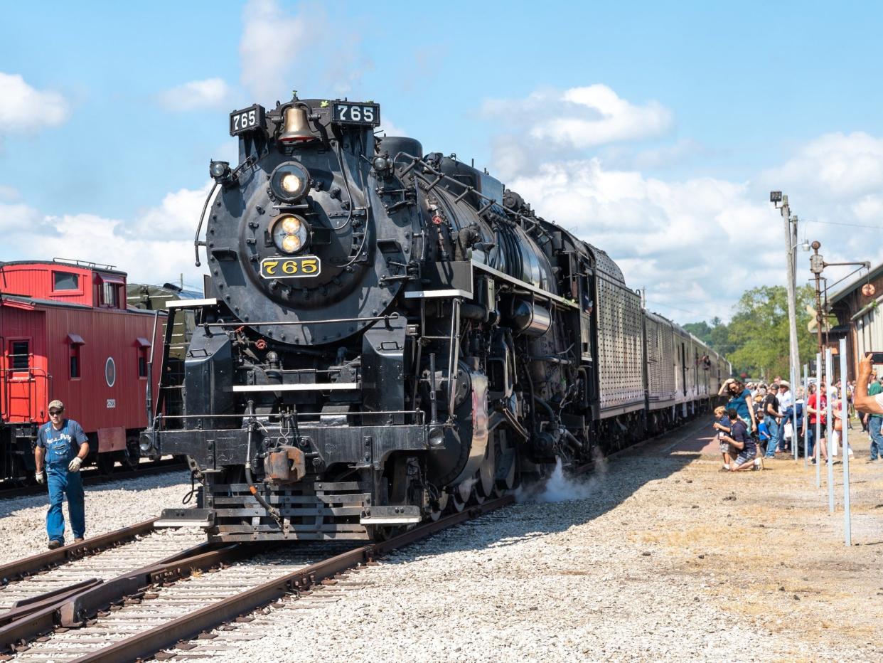 Scores of people lined the old railroad tracks near downtown Hillsdale to watch the arrival of the Tri-State Scenic Steam Excursion in the summer of 2022.