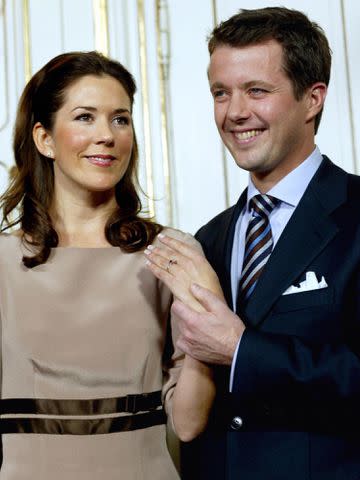 <p>KELD NAVNTOFT/AFP/Getty</p> Crown Prince Frederik shows the engagement ring on the hand of Mary Donaldson on October 8, 2003.