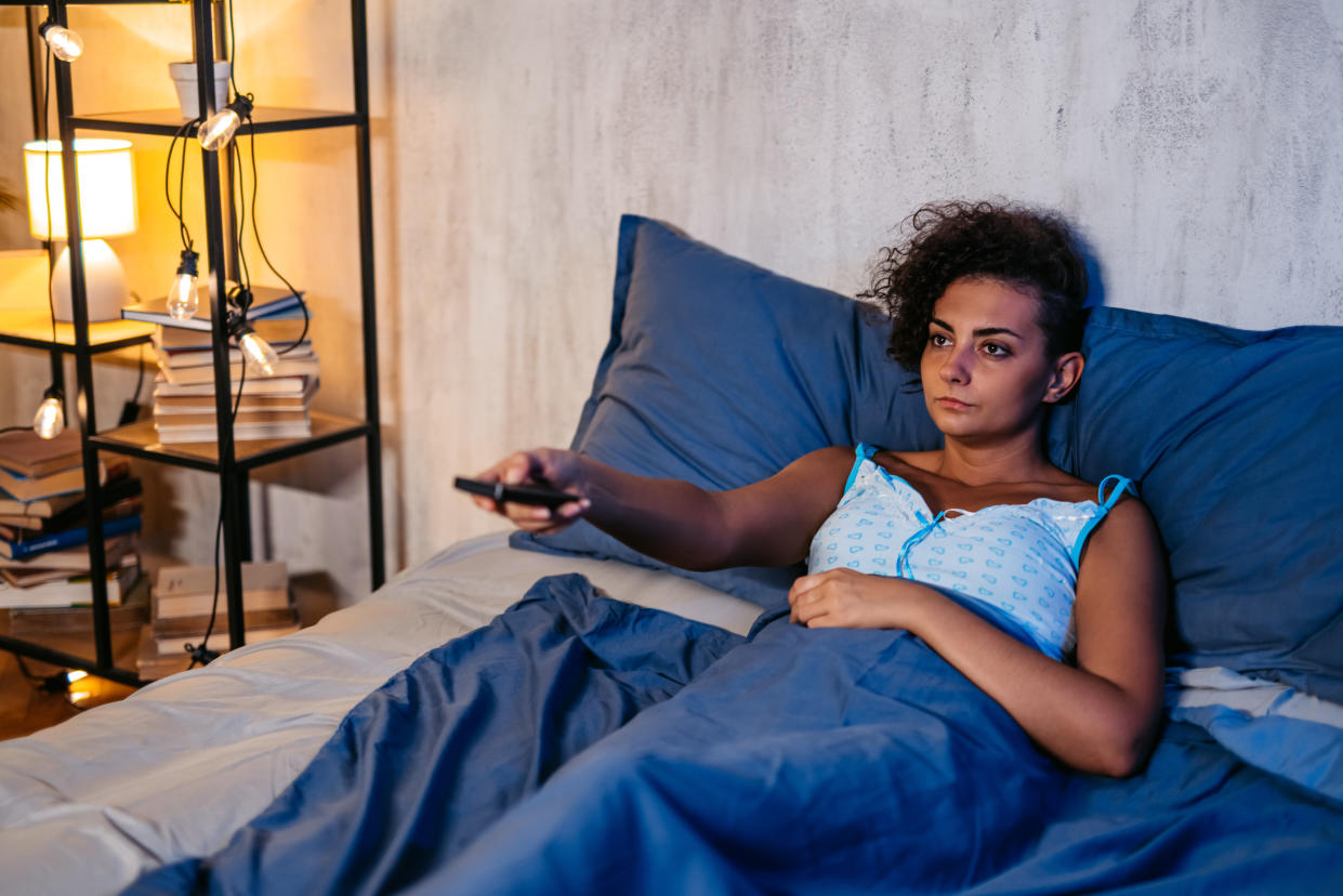 Some people can't sleep without the TV turned on. Is that a problem? (Getty Creative)