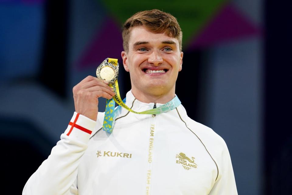 James Wilby celebrates with his gold medal (Tim Goode/PA) (PA Wire)