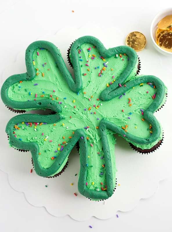 <p>Yellow Bliss Road</p><p>These chocolate mint cupcakes are topped with a gorgeous mint flavored green frosting and rainbow sprinkles. No worries about cutting the cake either because it’s a pull-apart cake!</p><p><strong>Get the recipe here: <a href="https://www.yellowblissroad.com/st-patricks-day-cupcake-cake/" rel="nofollow noopener" target="_blank" data-ylk="slk:Shamkock Cupcake Cake;elm:context_link;itc:0;sec:content-canvas" class="link ">Shamkock Cupcake Cake</a></strong></p>