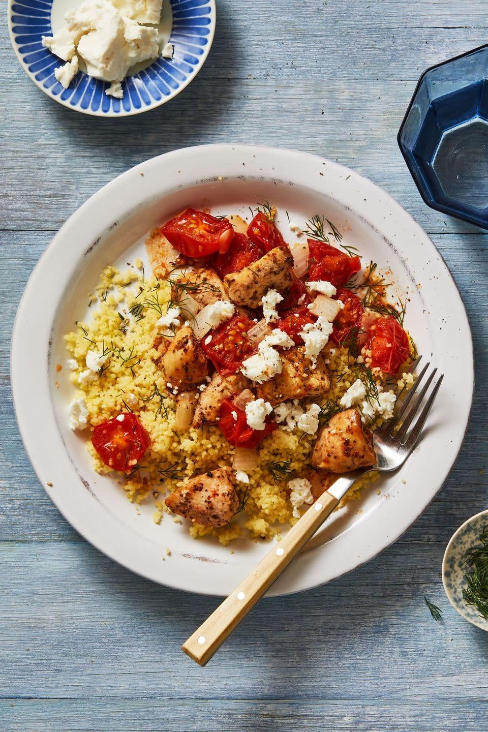 chicken and tomatoes over couscous