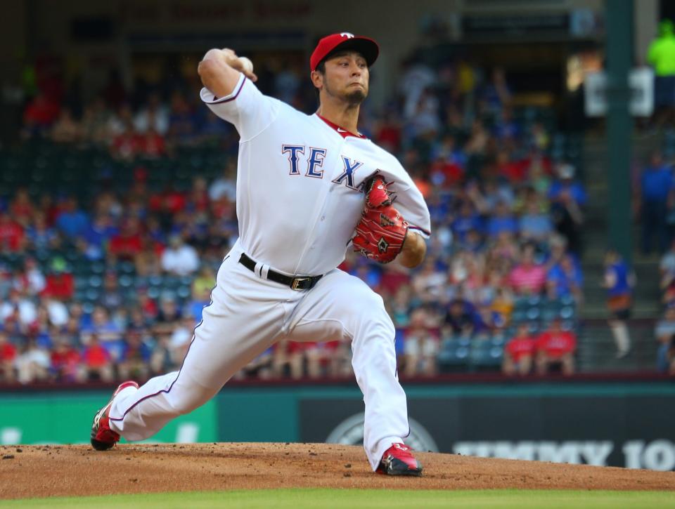 Yu Darvish #11 of the Texas Rangers throws in the first inning against the New York Mets at Globe Life Park in Arlington on June 7, 2017 in Arlington, Texas.