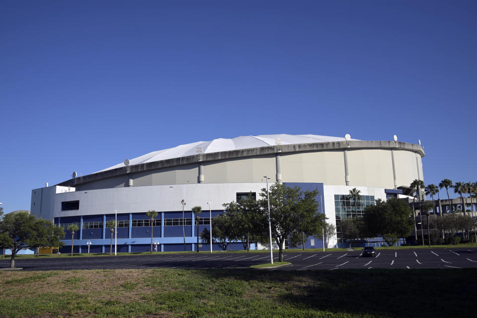 Tropicana Field is viewed after a baseball game, June 5, 2022, in St. Petersburg, Fla. The mayor of St. Petersburg, Florida, is reopening talks about the future of the Tropicana Field site where baseball's Tampa Bay Rays play their home games. Mayor Ken Welch said Wednesday, June 29, 2022 that two previous proposals for the 86-acre (348,000-square-meter) downtown location are being scrapped, with a new round of plans to be solicited beginning in mid-August. Welch, St. Petersburg's first Black mayor, has made a priority of including such things as affordable housing and greater job opportunities along with Rays baseball. (AP Photo/Phelan M. Ebenhack, file)