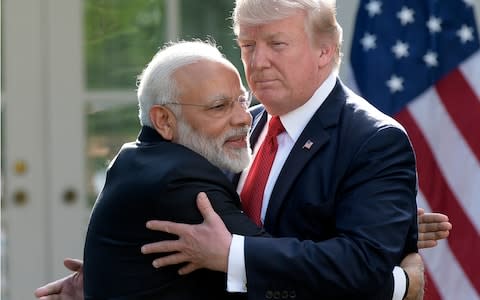 Narendra Modi is known for his warm embraces  - Credit:  Susan Walsh/ AP