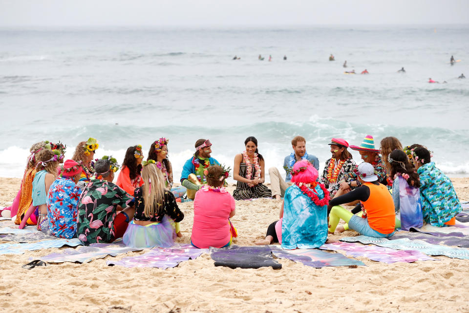 The pair sat down in the sand to talk mental health. Photo: Getty