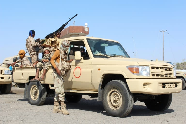 Forces loyal to the Saudi-backed Yemeni president stand guard on a road at the entrance to Abyan province as they take part in an operation to drive Al-Qaeda fighters out of the southern provincial capital, on April 23, 2016