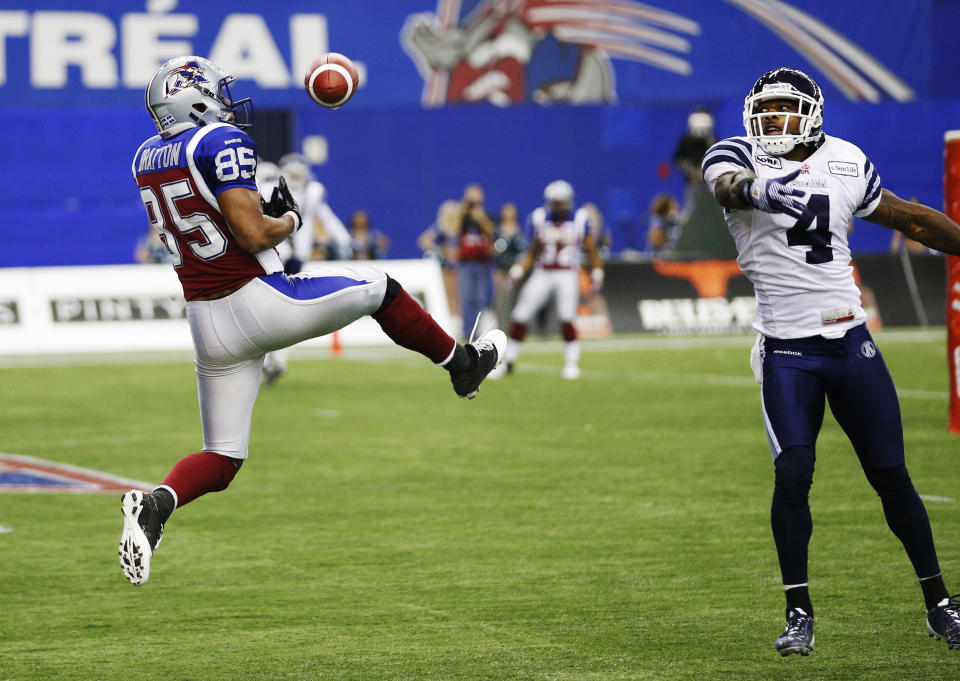 Alouettes Bratton misses a catch in the endzone as Argonauts Horne defends him during the CFL's Eastern Conference Final football game in Montreal