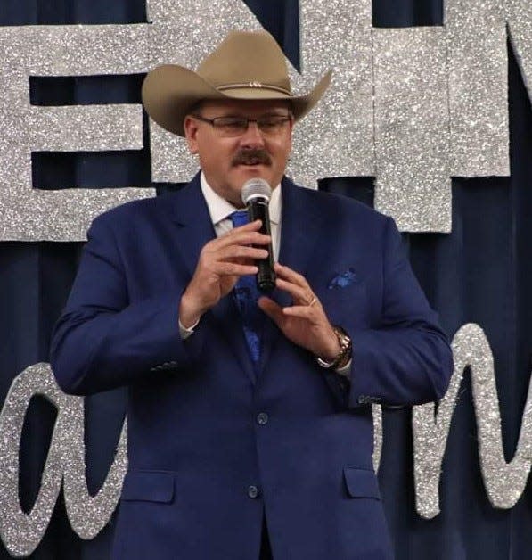 Dennis Huggins won first place in pro bid calling at the Arkansas Auctioneers Association state championship Saturday, May 14 at Hot Springs.