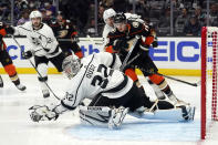 Los Angeles Kings goaltender Jonathan Quick (32) stops an Anaheim Ducks shot during the second period of an NHL hockey game Tuesday, April 19, 2022, in Anaheim, Calif. (AP Photo/Marcio Jose Sanchez)