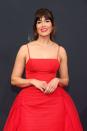 <p>Mandy Moore demonstrated this season's coolest hair trend, with piecey bangs and loose tendrils flanking a textured ponytail. Make-up artist Kindra Mann got the memo painting Moore's lips pillarbox red to match her Carolina Herrera gown.</p>