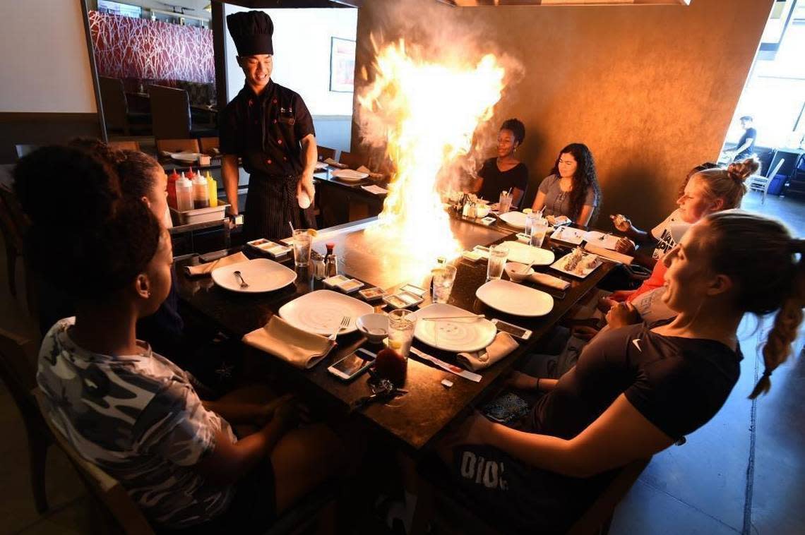 Barry Sayachack prepares a teppanyaki lunch for the Fresno State women’s basketball team at Hino Oishi at Campus Pointe in this Fresno Bee file photo from 2016. Hino Oishi won an award for best Japanese restaurant from the California Restaurant Association.
