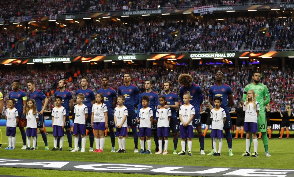 <p>The Manchester United team take part in a minutes silence in memory of the victims of the Manchester Concert attack prior to the UEFA Europa League Final between Ajax and Manchester United at Friends Arena on May 24, 2017 in Stockholm, Sweden. </p>