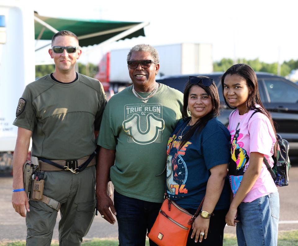 Matt Nierenjerger, Willie Reed, Daphne Carter and Phendia Prather gather for the Firefighters Freedom Festival July 3, 2022 at McKellar Sipes Regional Airport.