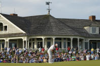 Brooks Koepka putts a boggie on the 18th green during the third round at the PGA Championship golf tournament on the Ocean Course, Saturday, May 22, 2021, in Kiawah Island, S.C. (AP Photo/Matt York)