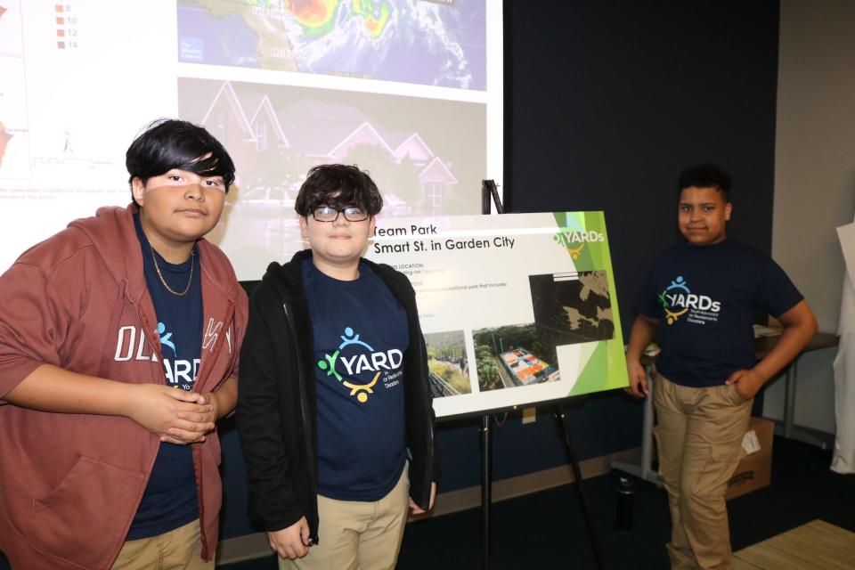 Students present their plan for an outdoor community recreation and green space on Smart Street.